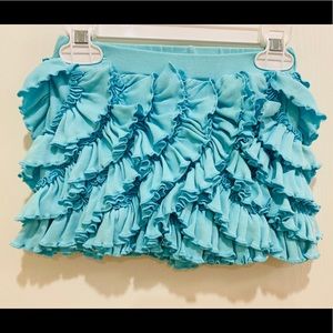 Turquoise ruffle skort from Chasing Fireflies